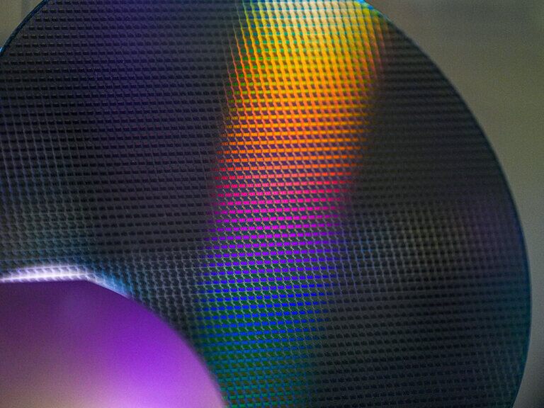 GlobalFoundries’ New Fab; Tech Firms Sign Up on AI; Tesla to Invest $15bn