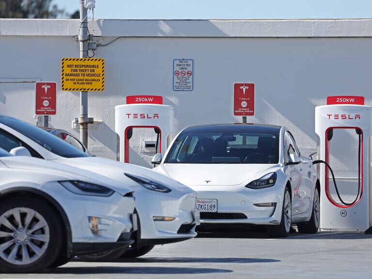 Tesla margins shrink sharply, shares slip afterhours